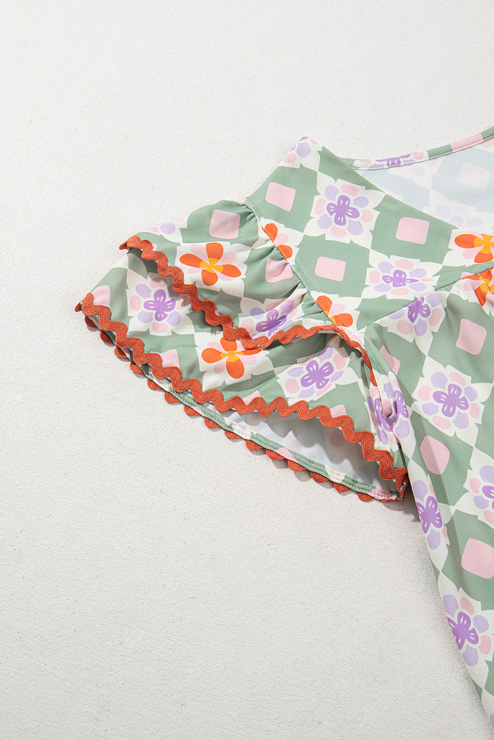 geometric floral print layered flutter sleeve v neck ric rac trim blouse