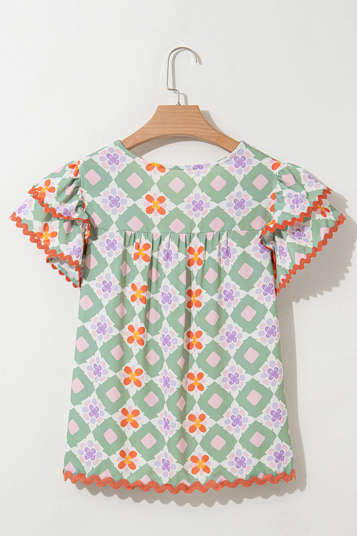 geometric floral print layered flutter sleeve v neck ric rac trim blouse