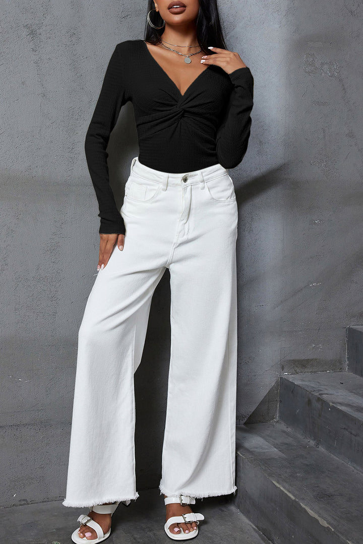 Schwarzes, strukturiertes, langärmliges, schmales, einfarbiges Oberteil mit V-Ausschnitt und verdrehter Vorderseite