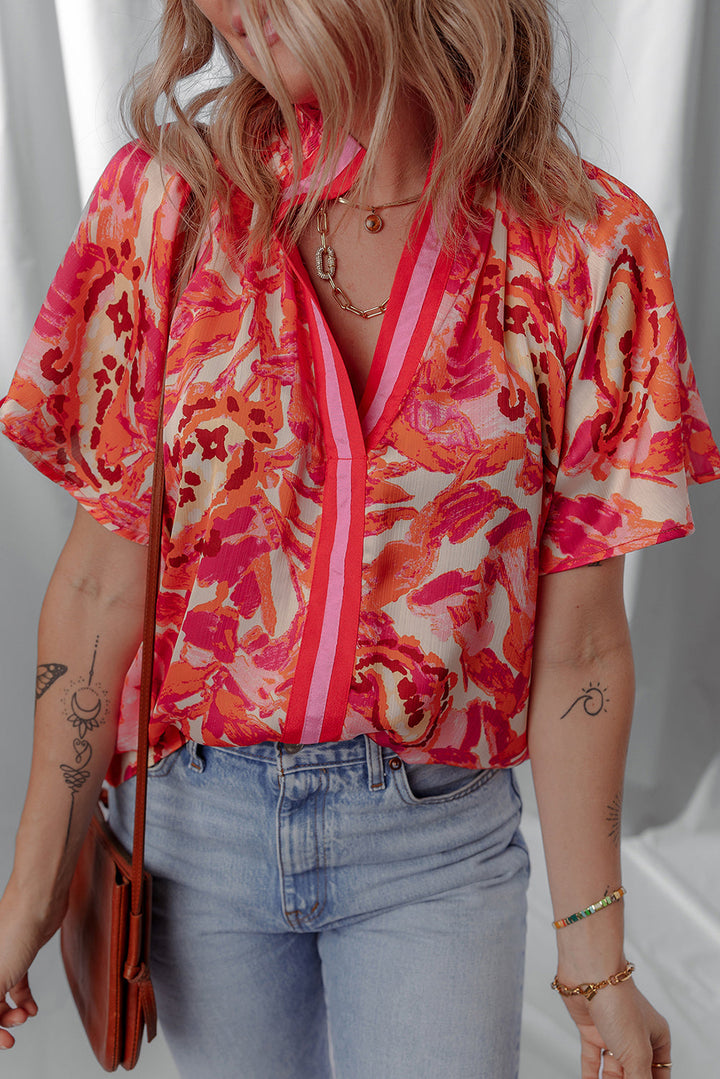 abstract print striped trim split neck blouse