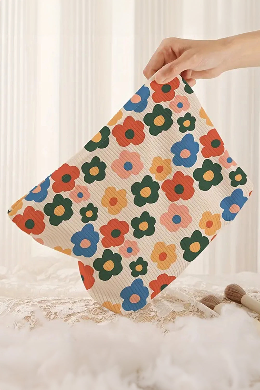 Trousse de maquillage texturée à imprimé floral