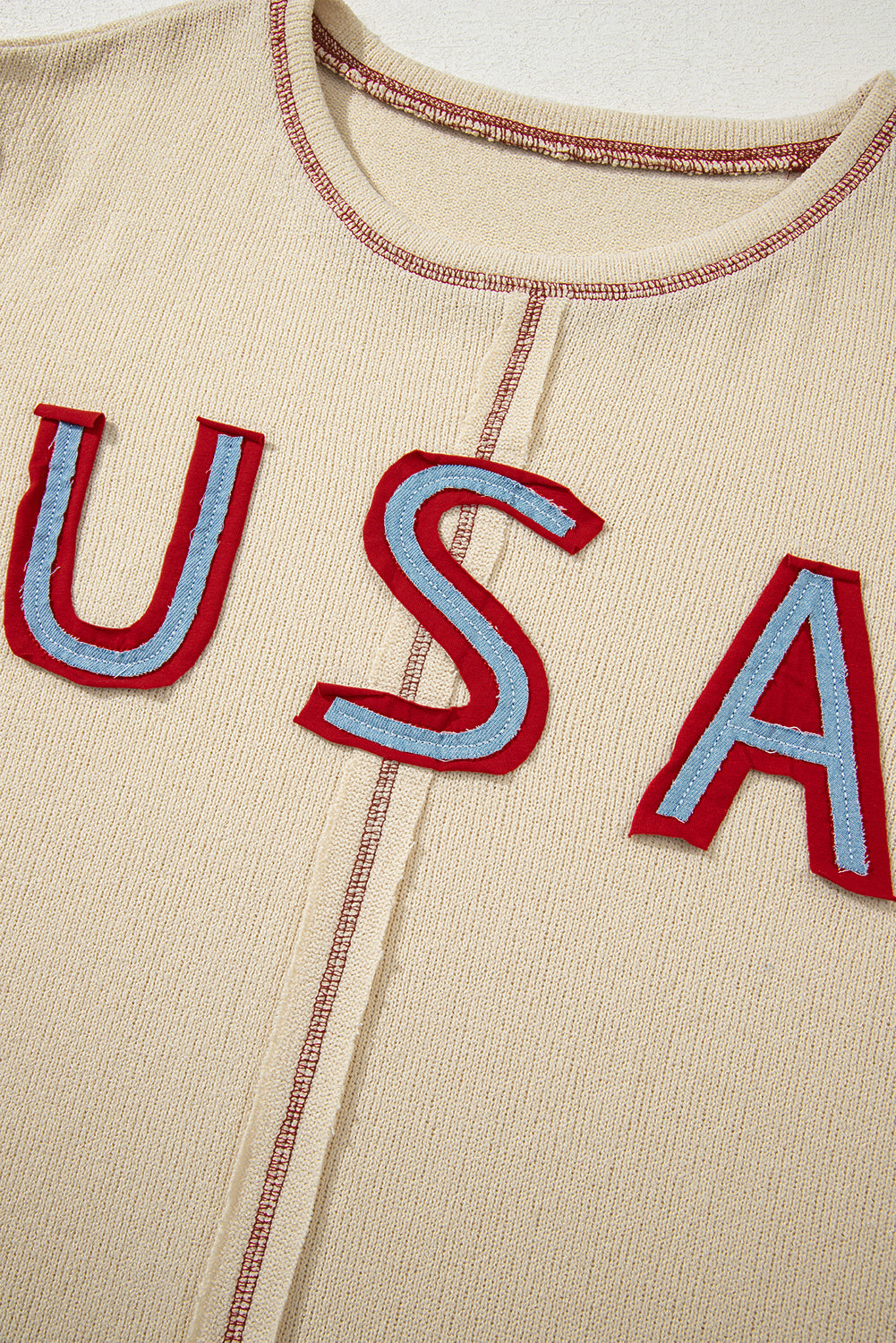 Beiges Langarm-Top mit USA-Star-Kontrast-Patchwork