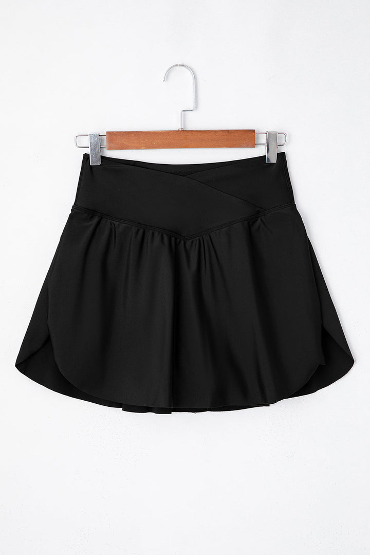solid pocketed crossover high waist swim skort 1