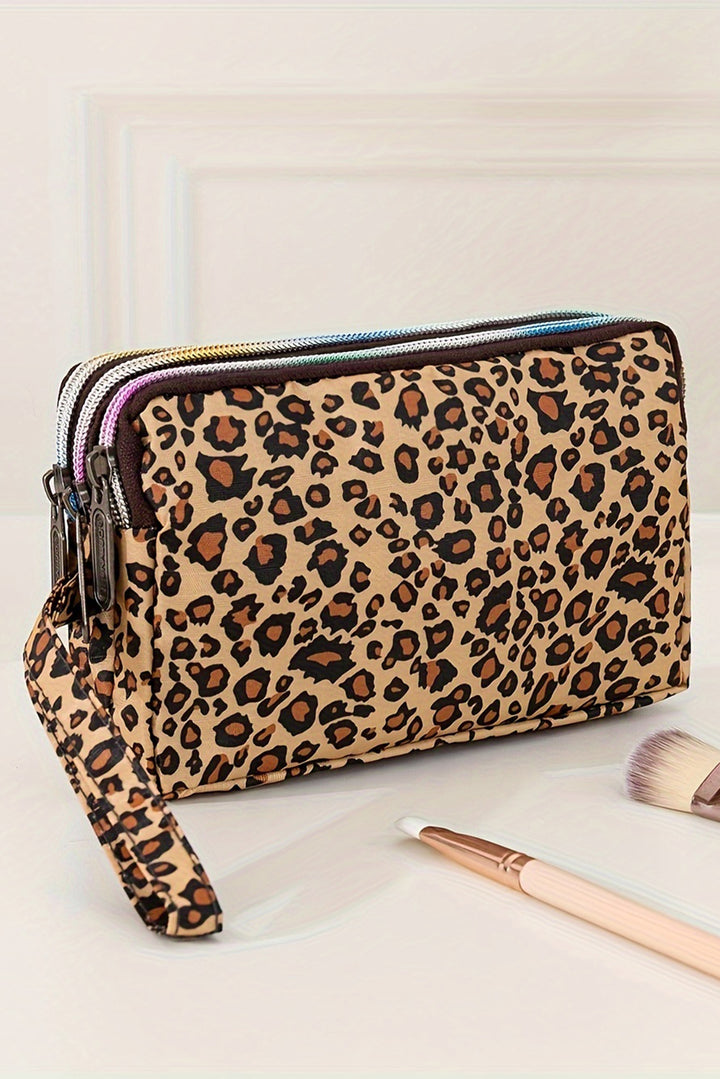 Trousse de maquillage zippée en cuir PU imprimé léopard avec dragonne