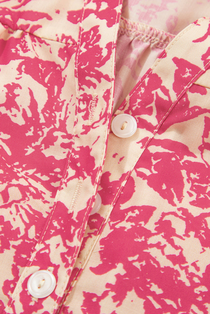 allover printed half button neck ruffle sleeve blouse