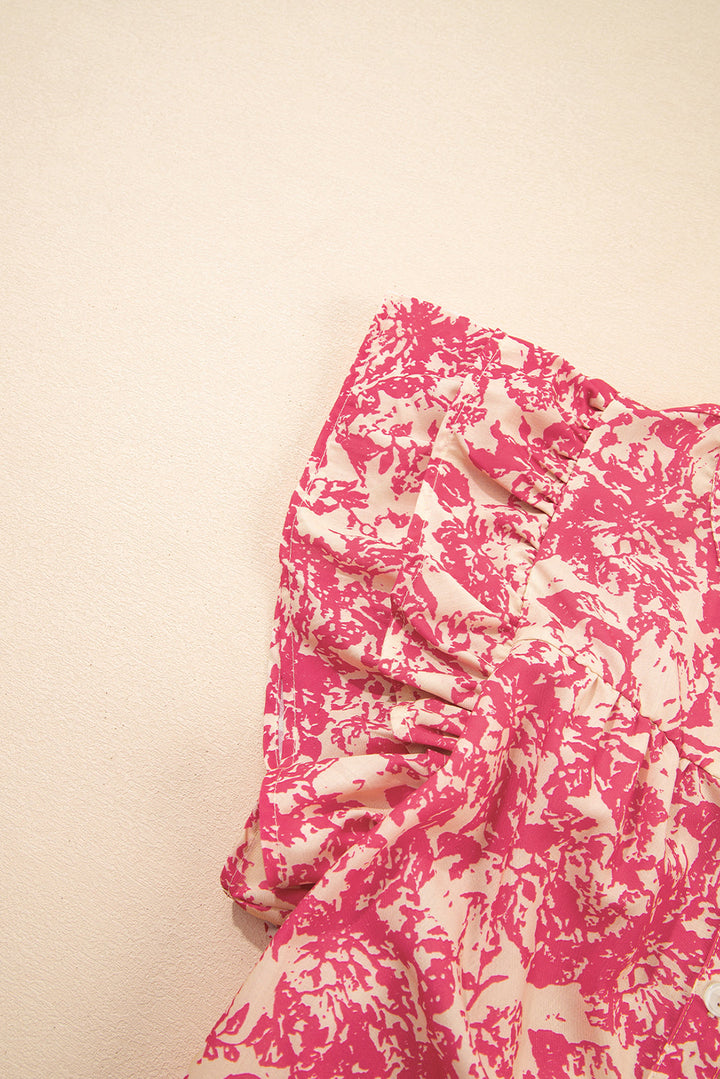 allover printed half button neck ruffle sleeve blouse