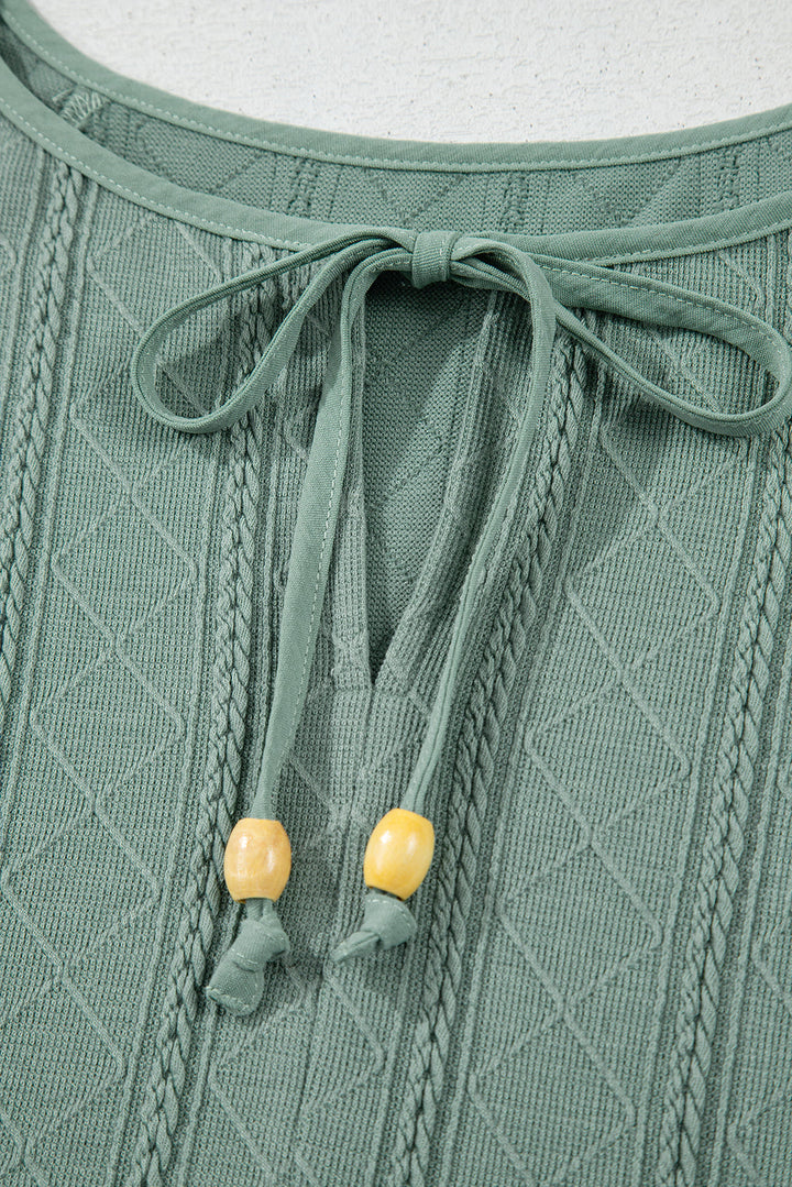 tie split neck textured ruffle patchwork blouse