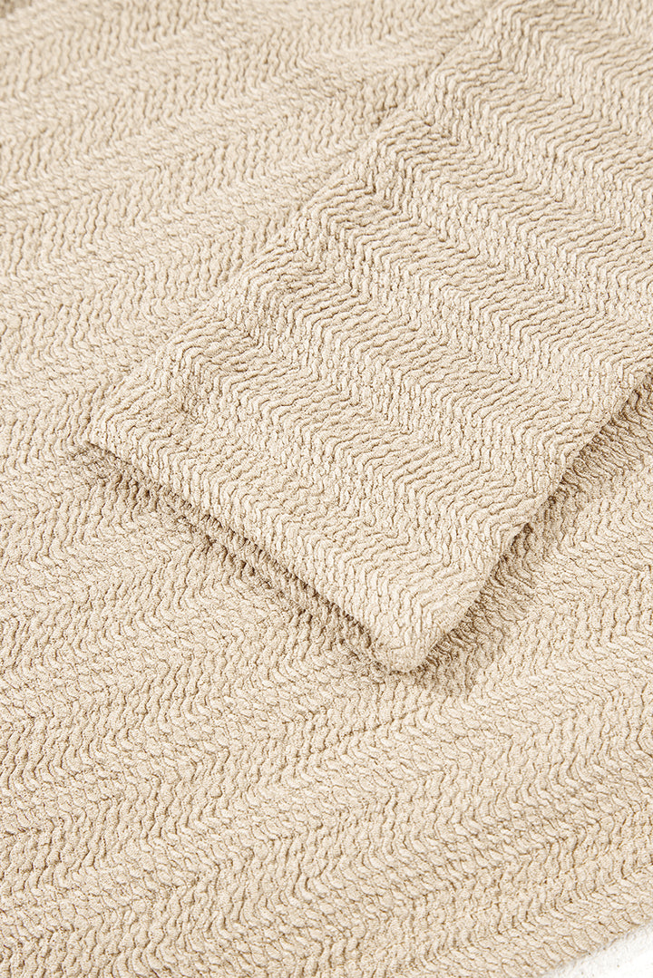 Helles Khaki-Oberteil mit V-Ausschnitt, langen Ärmeln und schmaler, einfarbiger Optik