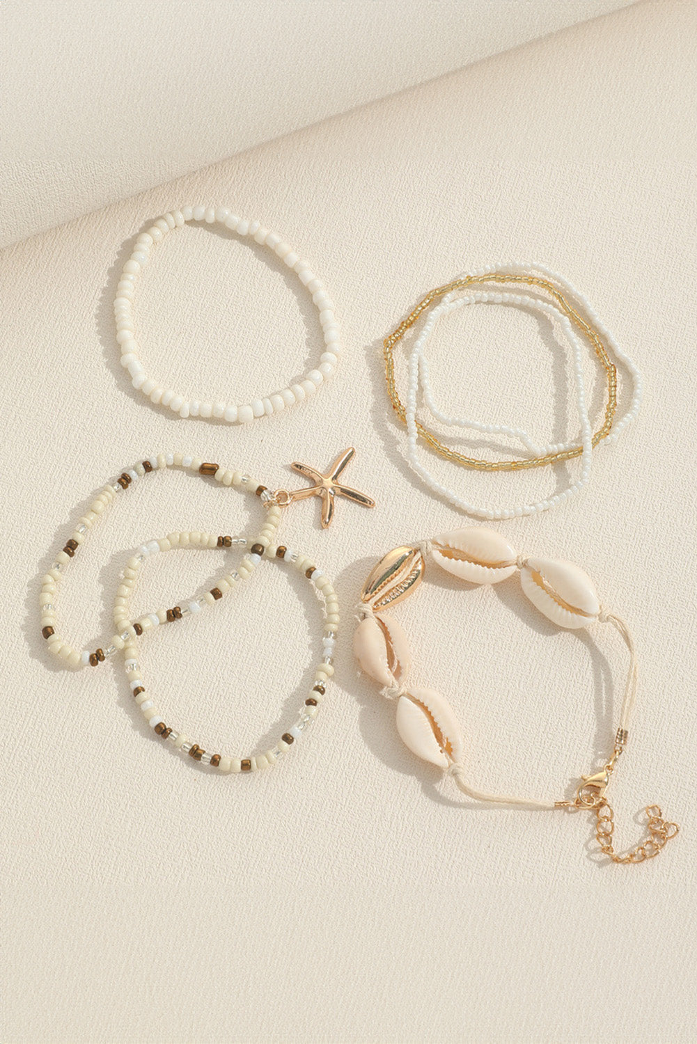 Lot de 7 bracelets de perles bohèmes en coquillage et étoile de mer