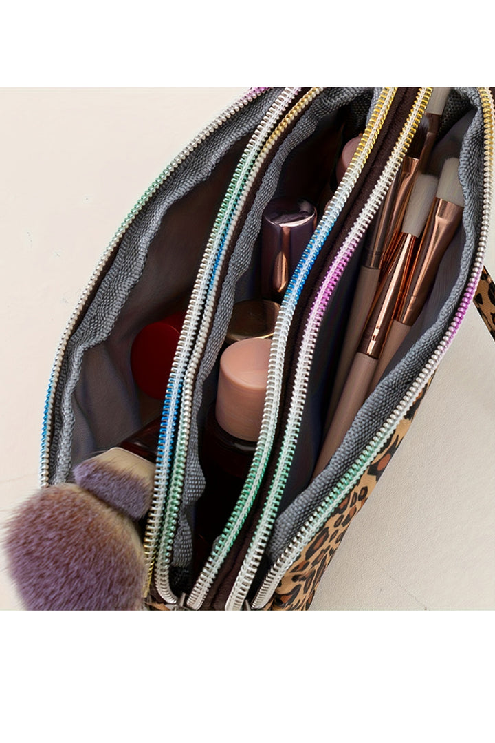 Trousse de maquillage zippée en cuir PU imprimé léopard avec dragonne