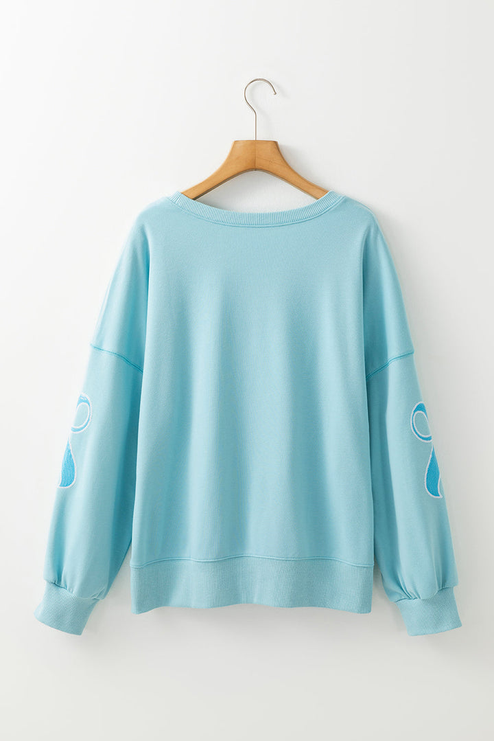 Sequined Bowknot Drop Shoulder Oversized Sweatshirt