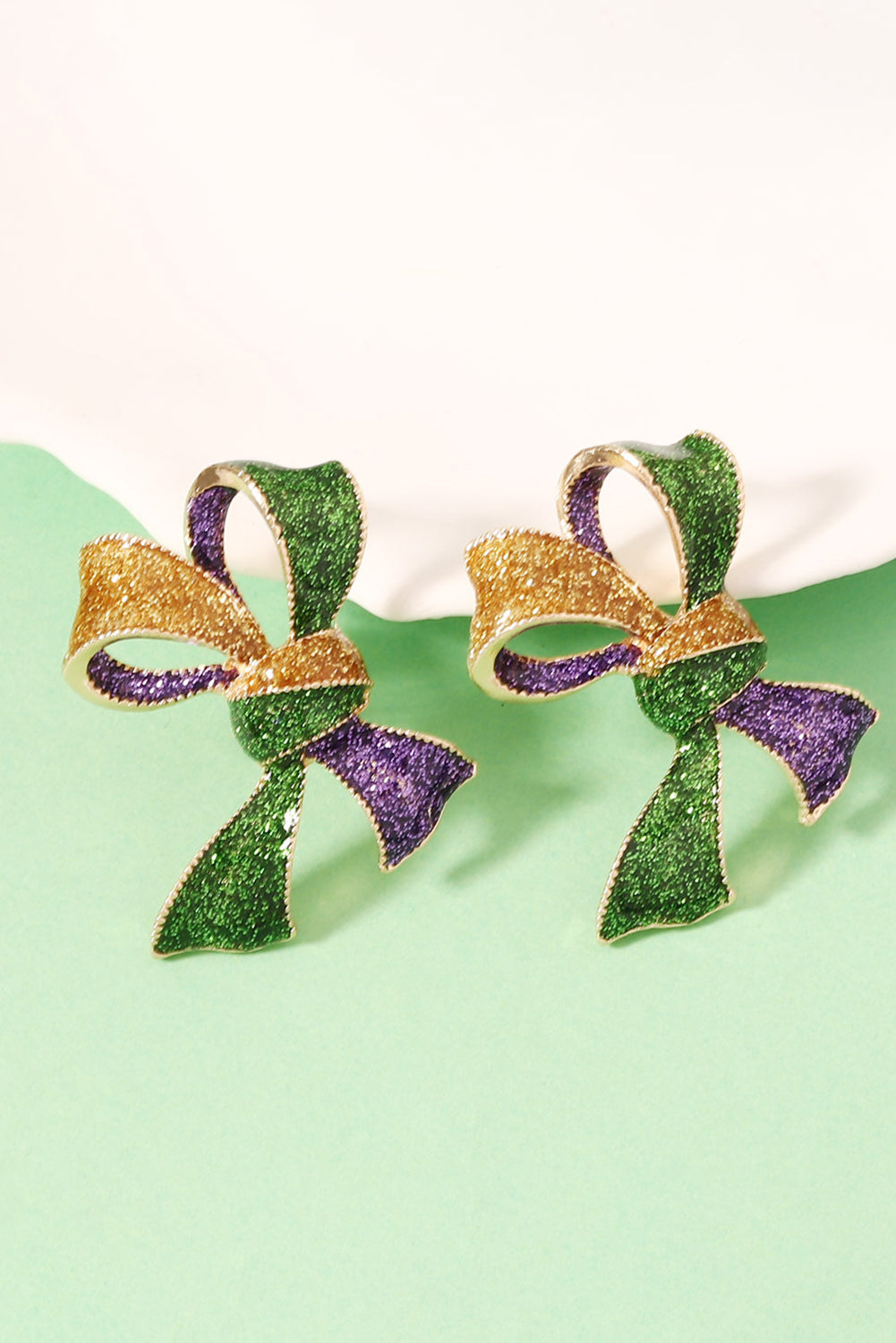 Boucles d'oreilles éblouissantes avec nœud 3D Mardi Gras