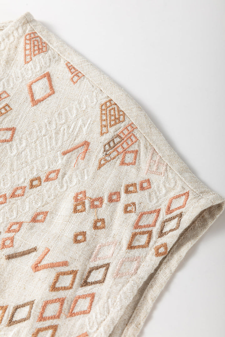 Geometric Embroidered Short Sleeve Tassel Tied V Neck Blouse