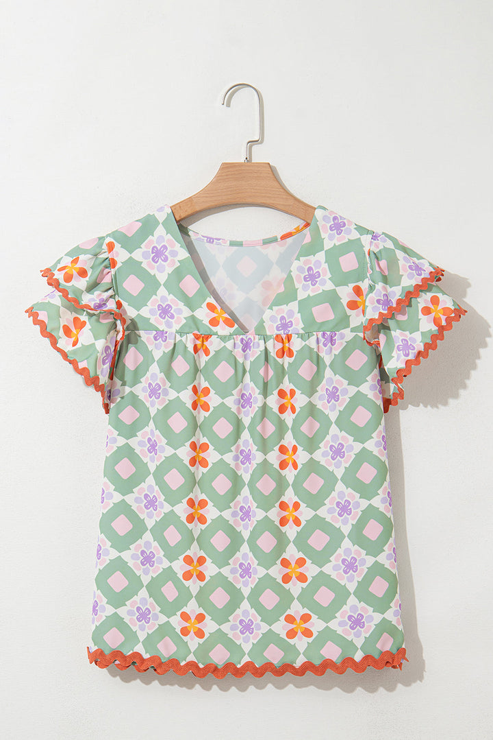 geometric floral print layered flutter sleeve v neck ric rac trim blouse