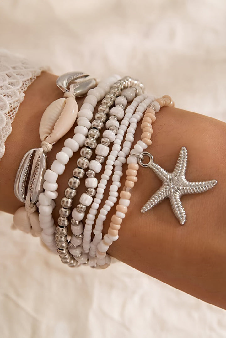 7-teiliges Perlenarmband-Set mit Seesternen und Muscheln