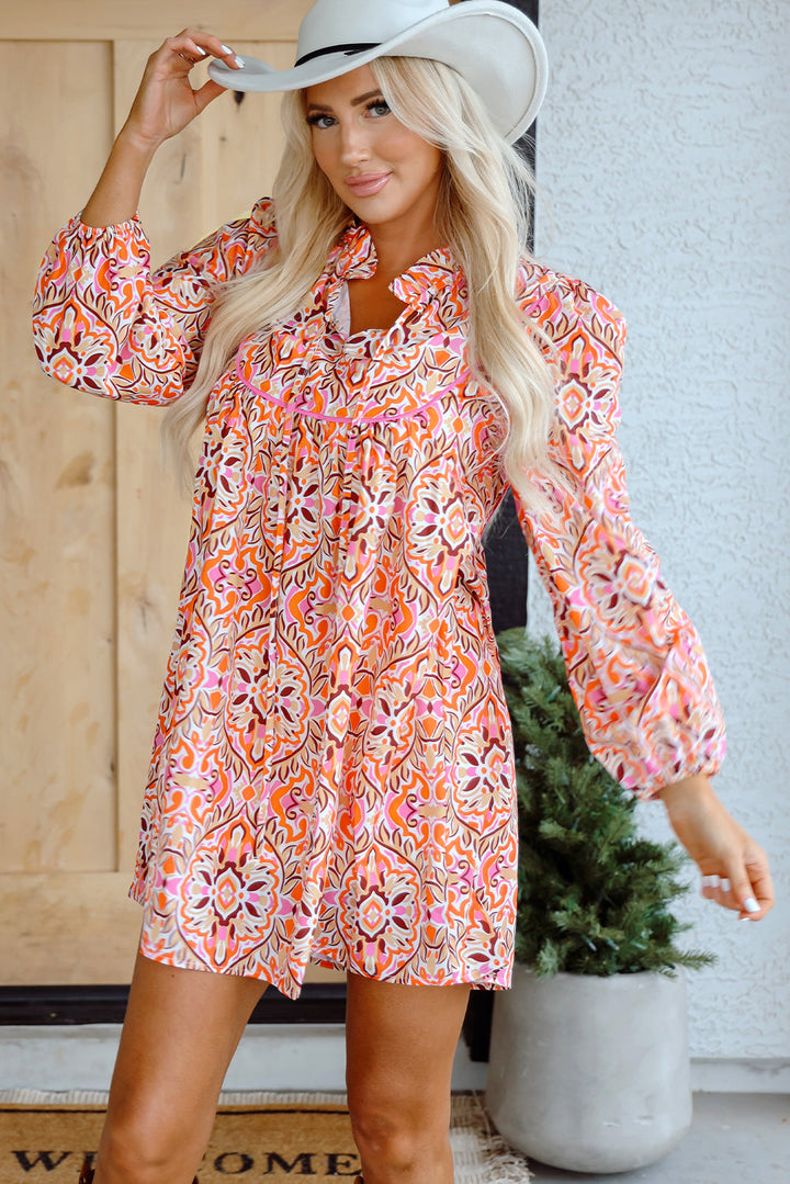 Abstract Printed Long Sleeve Tied Neckline Mini Dress