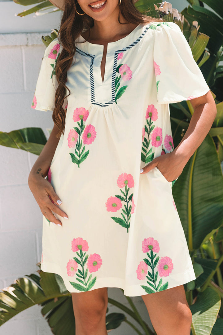 Lockeres Minikleid mit Blumenmuster und kurzen Ärmeln sowie Schlitz am Ausschnitt