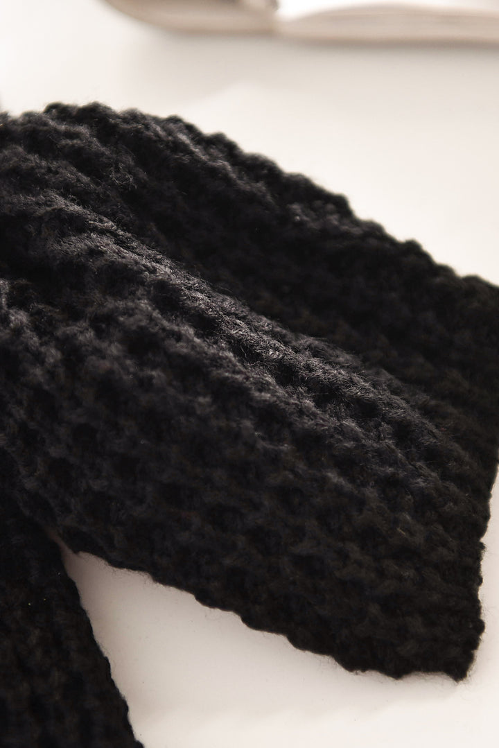 Pull col roulé cache-cœur boutonné noir