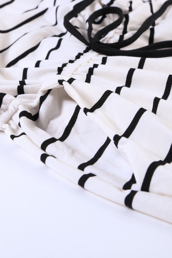 Ärmelloser Lounge-Strampler mit weißen und schwarzen Streifen