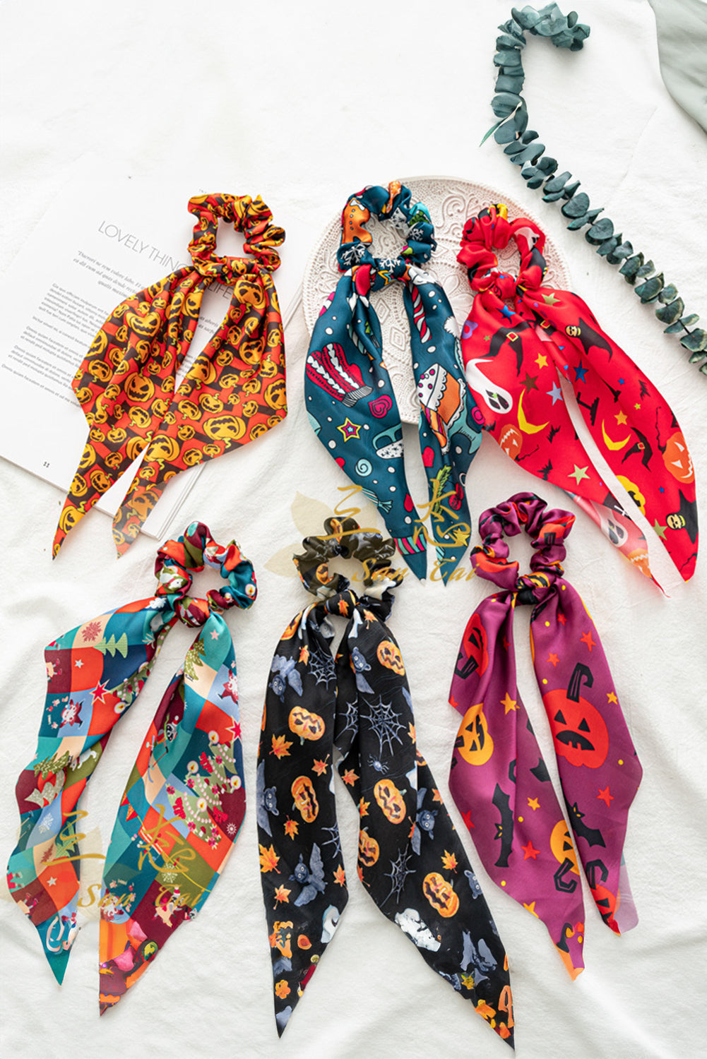 Chouchou en satin imprimé visage de citrouille d'Halloween