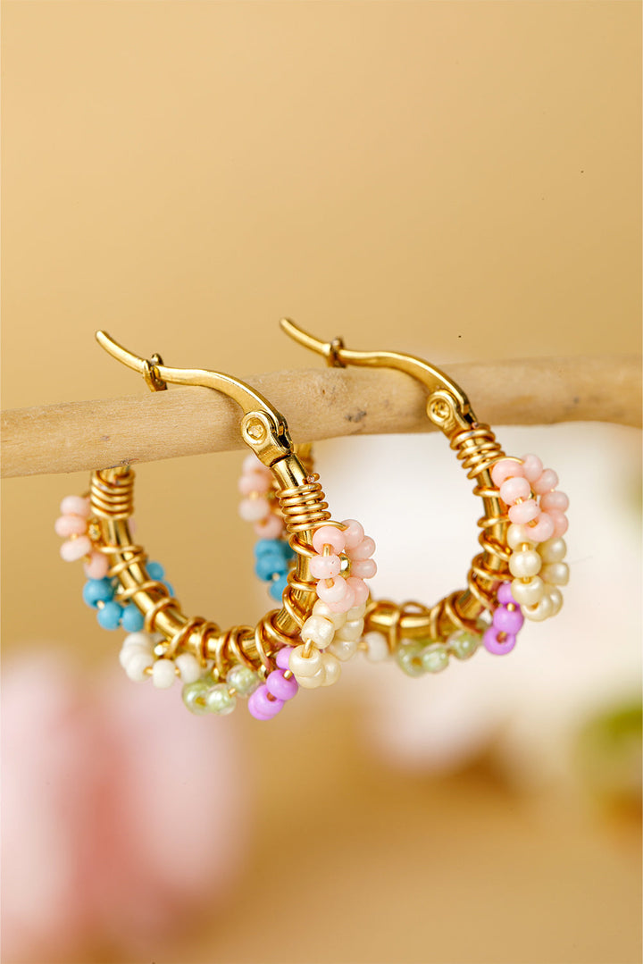 Boucles d'oreilles créoles en alliage avec fleurs perlées