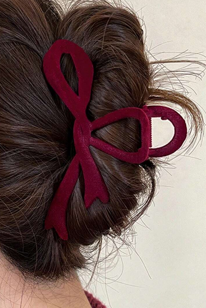 Grande pince à cheveux en velours avec nœud papillon