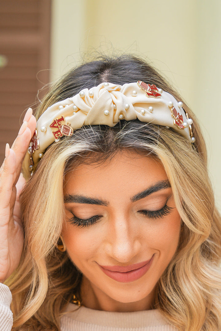 Bandeau à nœud torsadé avec perles de cristal et détails rugby LOVE