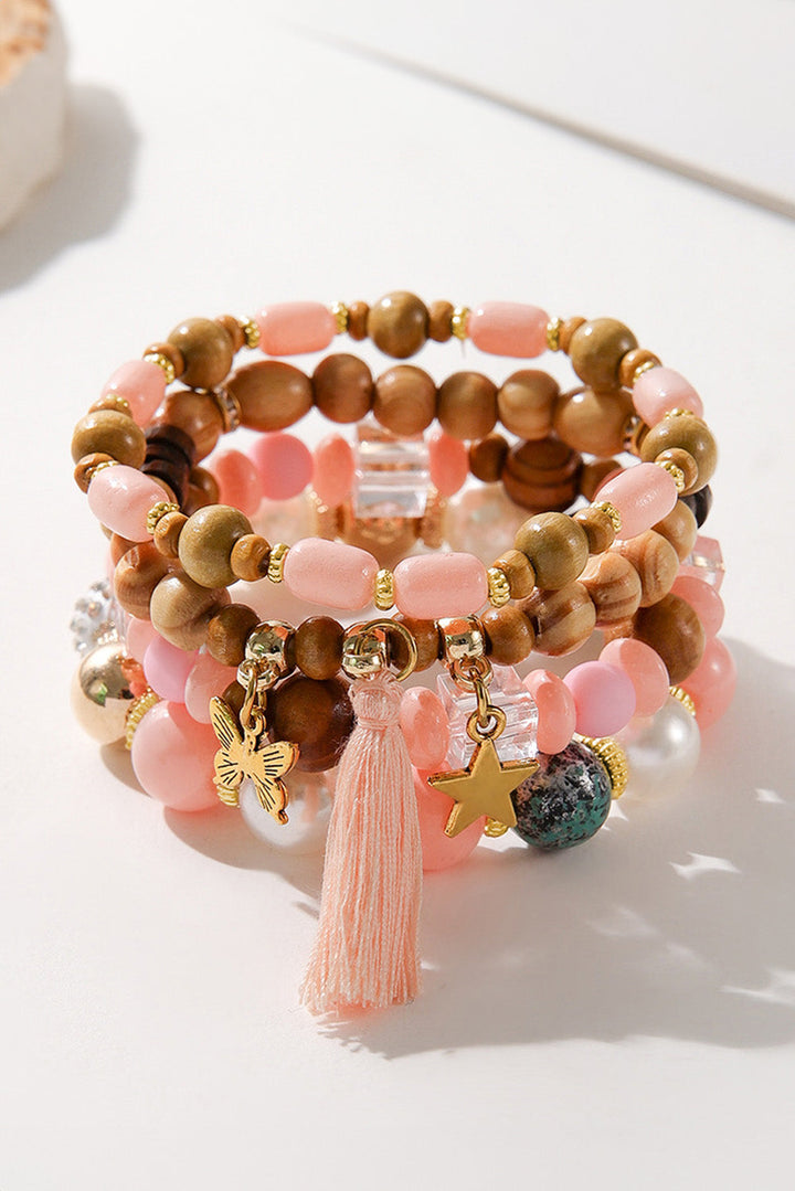 Ensemble de 4 bracelets à pompons et pendentifs en forme d'étoile et de papillon
