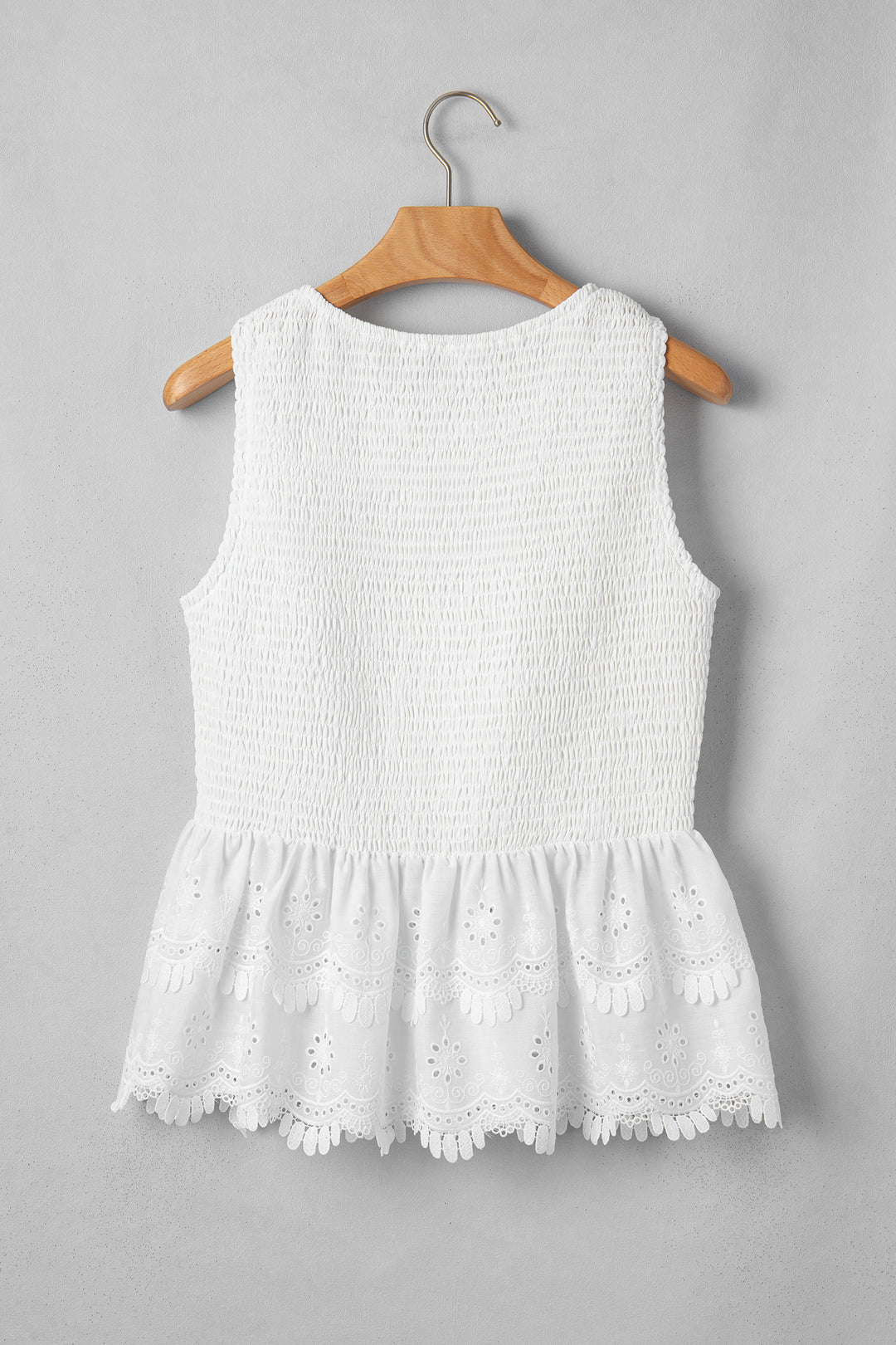 Chic White Sleeveless Smocked Lace Peplum Top