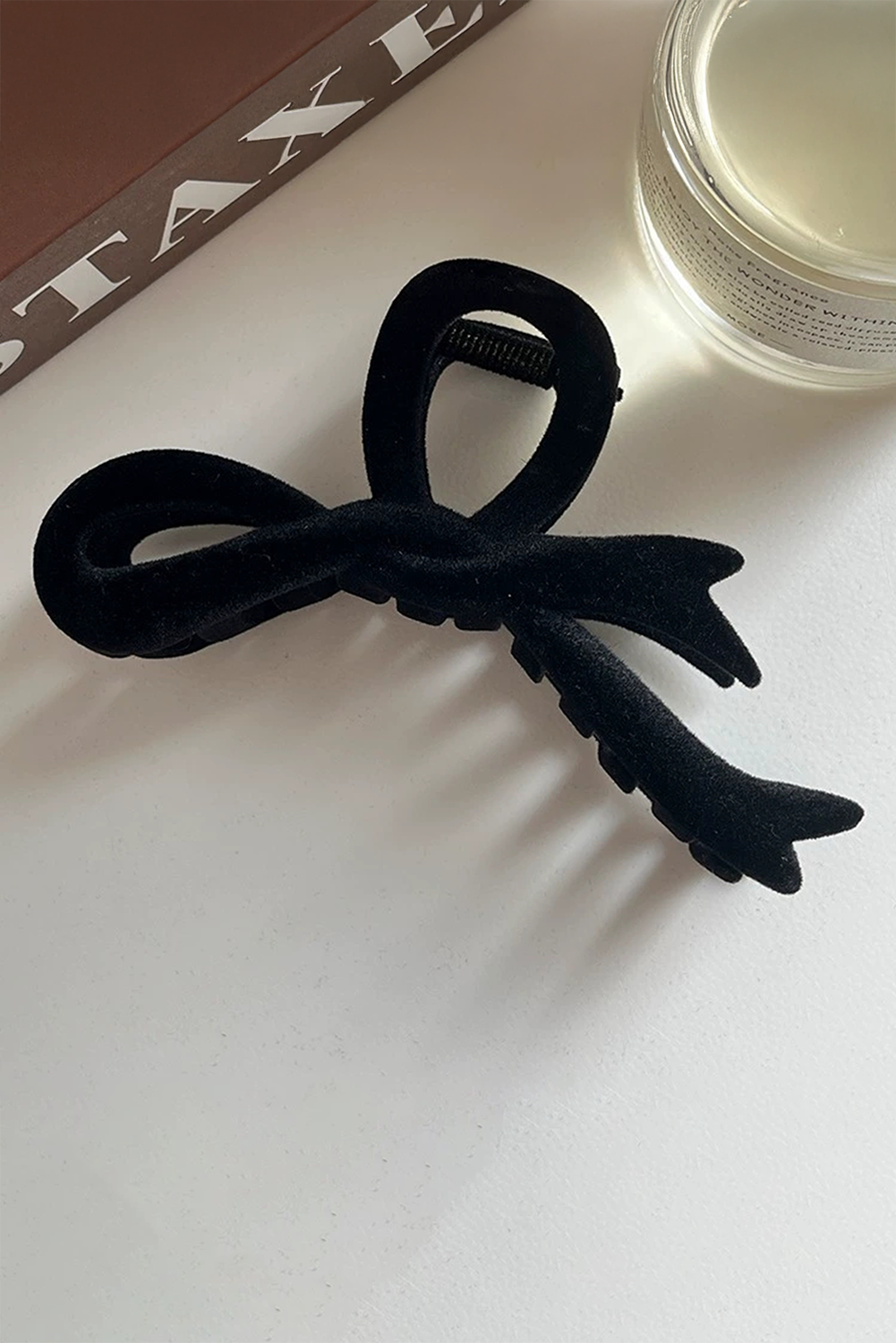 Grande pince à cheveux en velours avec nœud papillon