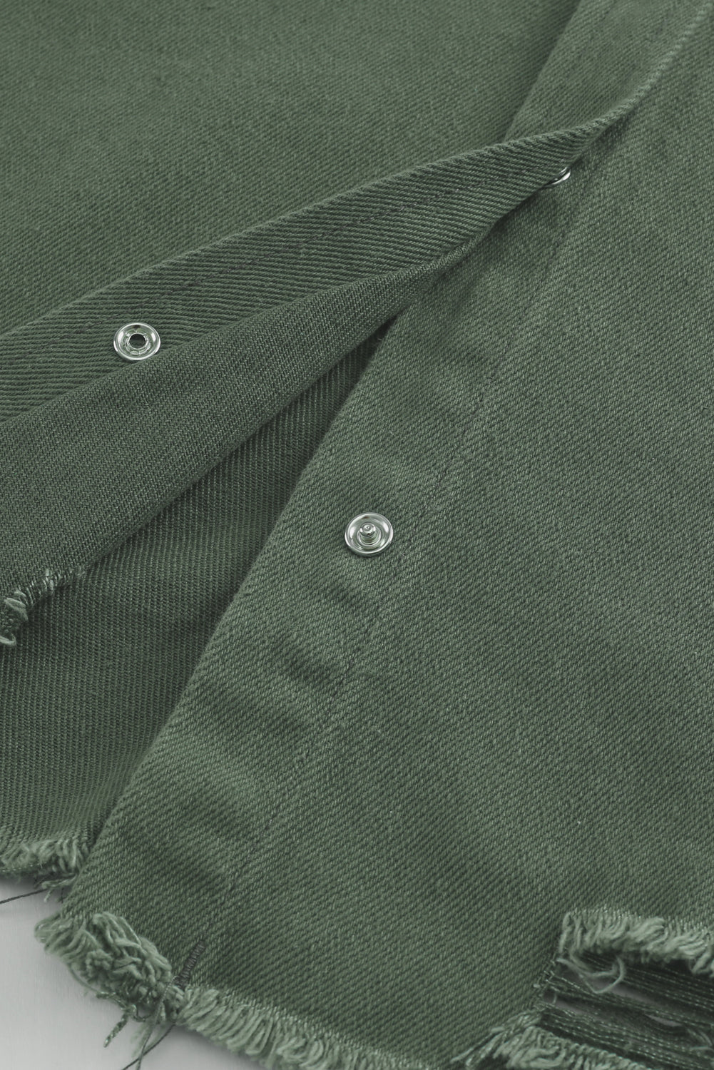 Veste en jean déchirée