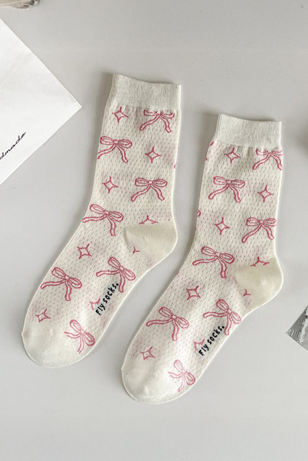 Chaussettes mi-mollet à imprimé nœud papillon