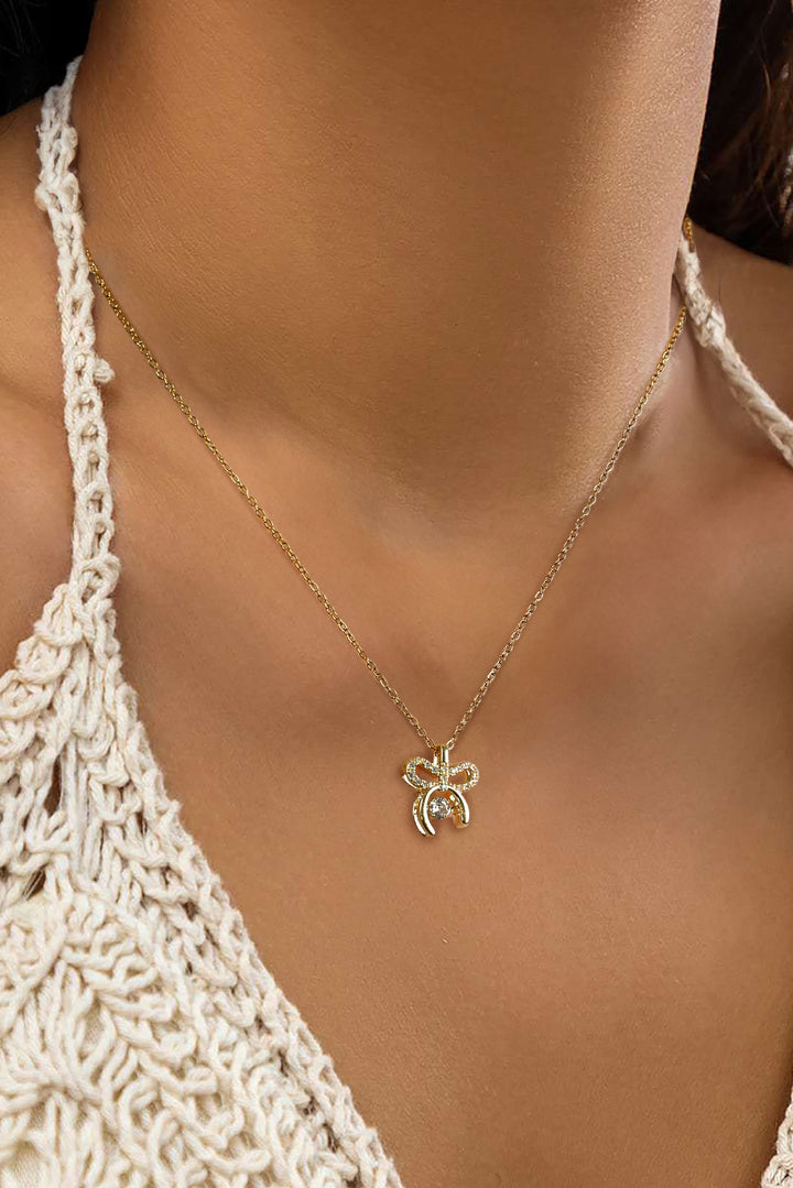 Collier en alliage plaqué avec pendentif nœud papillon en strass