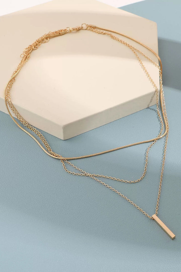 Collier chaîne réglable à plusieurs niveaux avec pendentif en barre