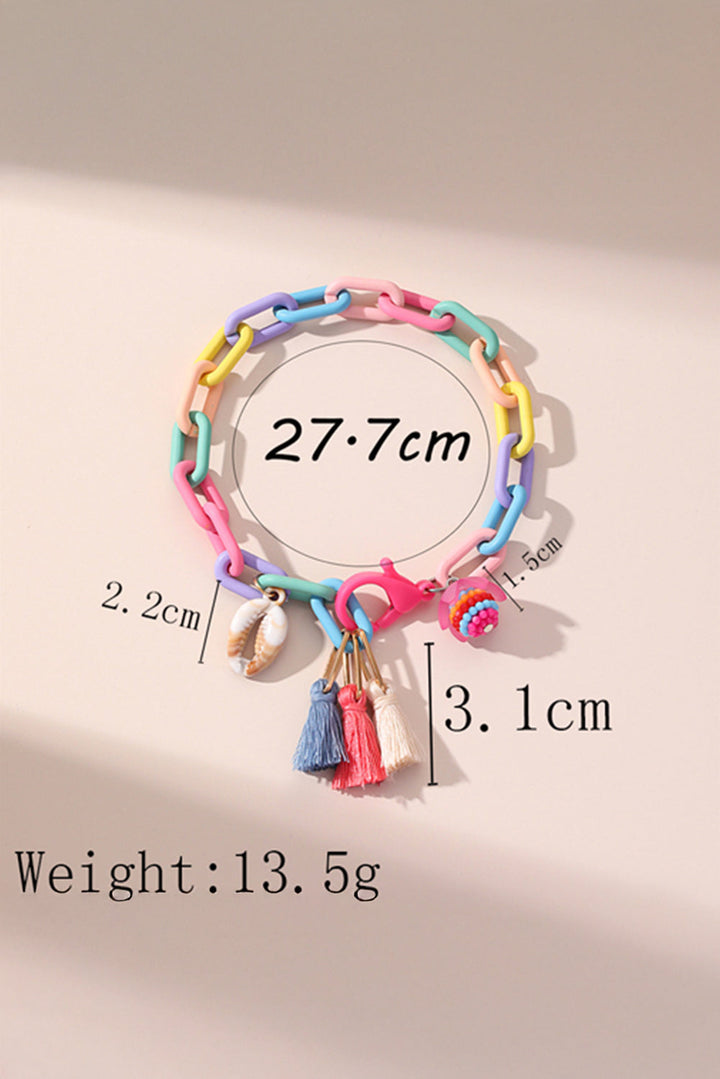Bracelet de cheville réglable à maillons colorés avec pompon coquillage