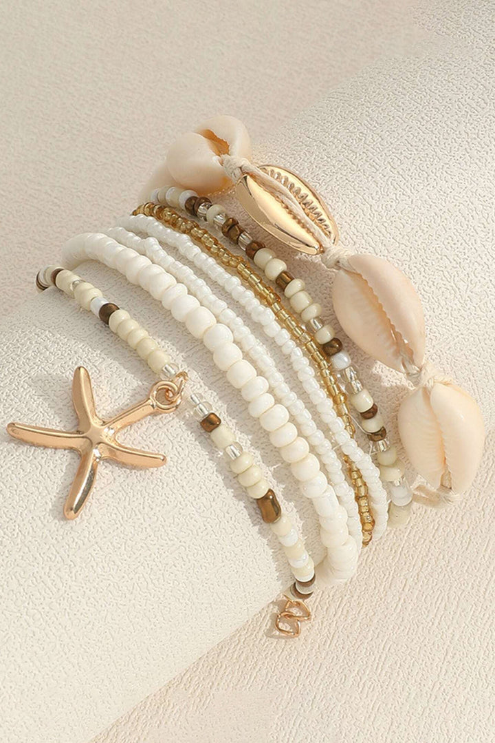 Ensemble de bracelets multicouches en perles avec décor de coquillages et d'étoiles de mer