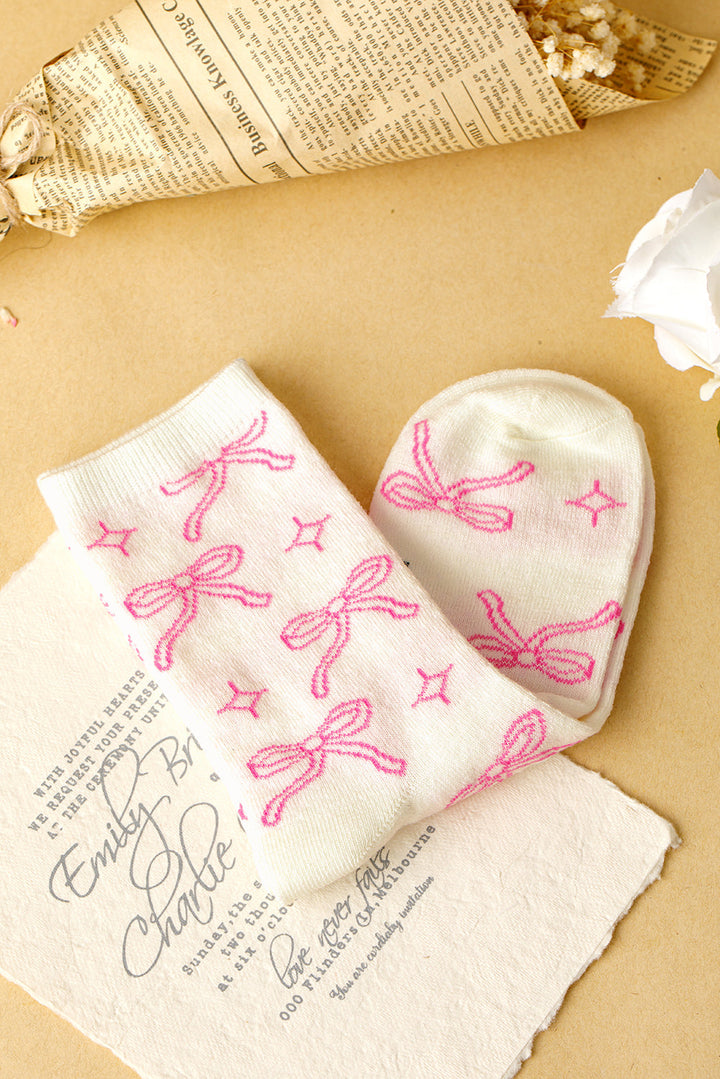 Chaussettes mi-mollet à imprimé nœud papillon
