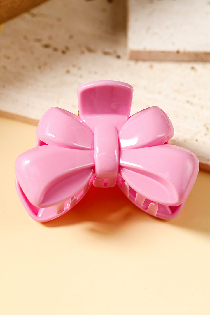 Pince à cheveux brillante en forme de nœud papillon