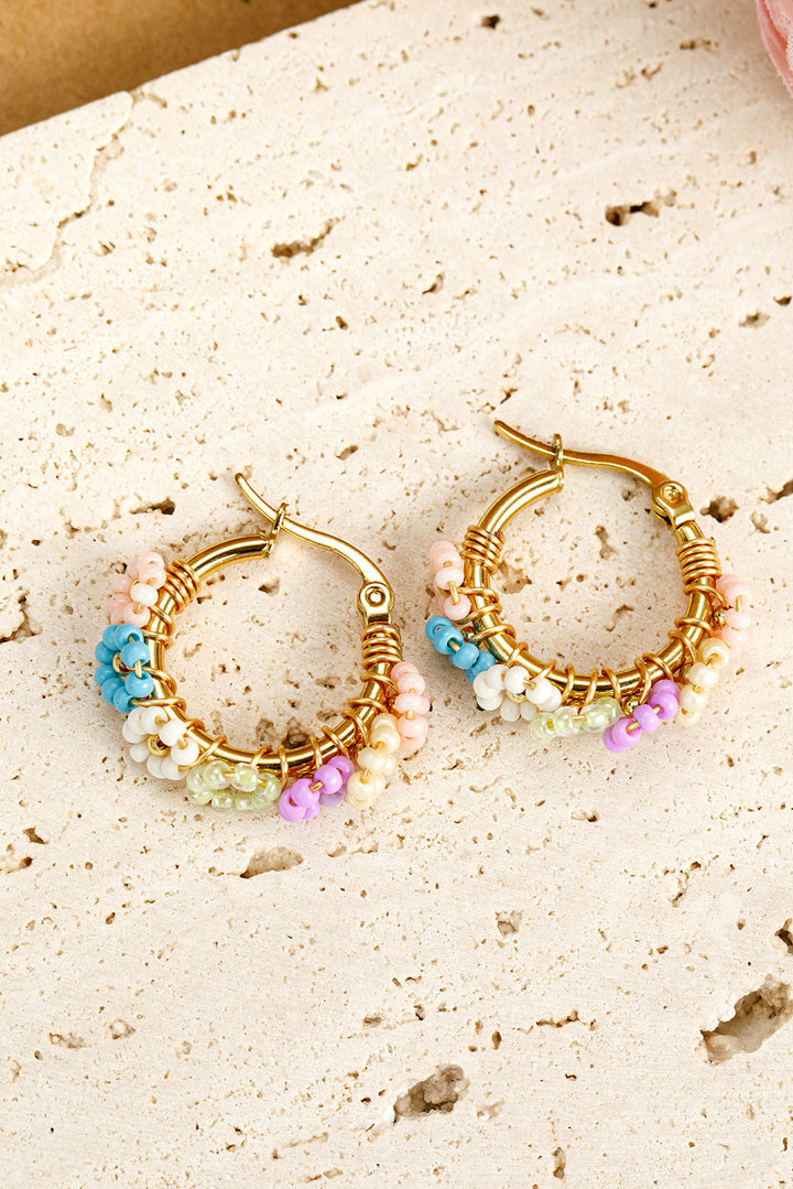 Boucles d'oreilles créoles en alliage avec fleurs perlées