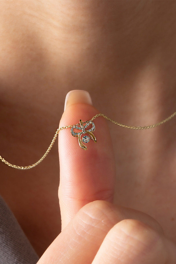 Collier en alliage plaqué avec pendentif nœud papillon en strass