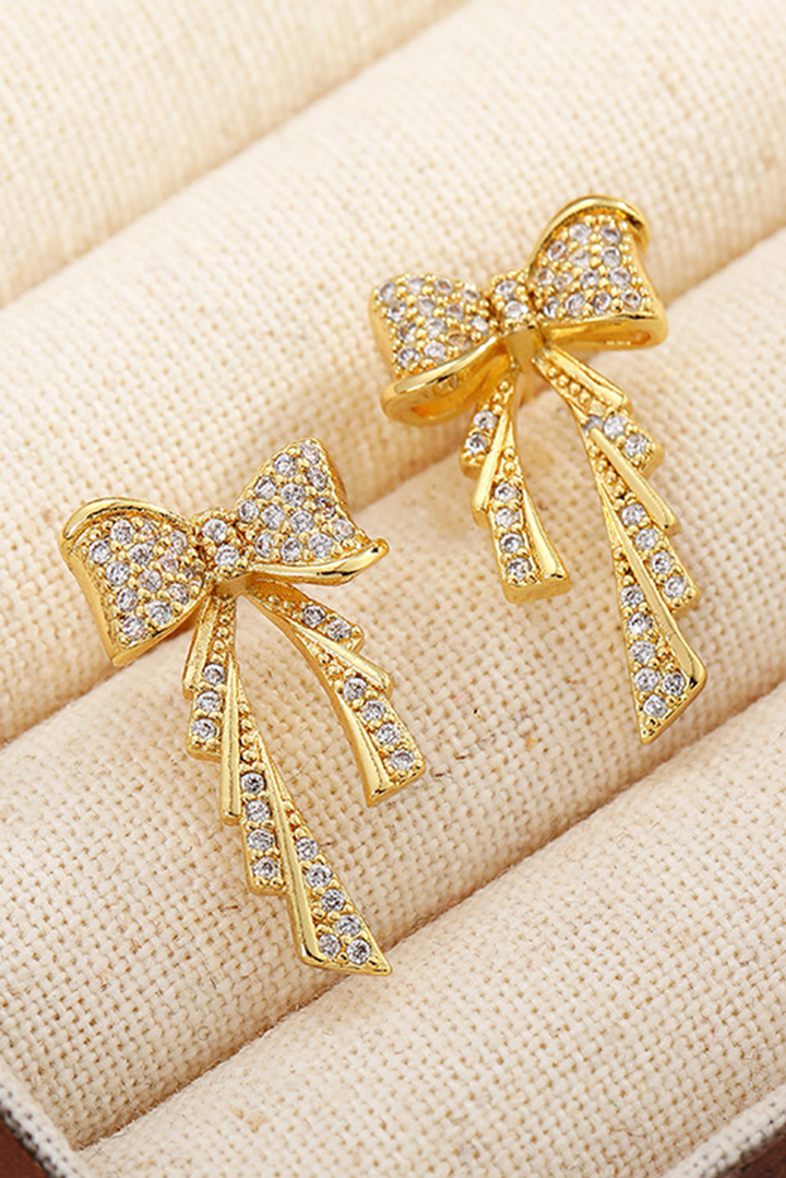 Boucles d'oreilles à tige plaquées avec nœud en strass