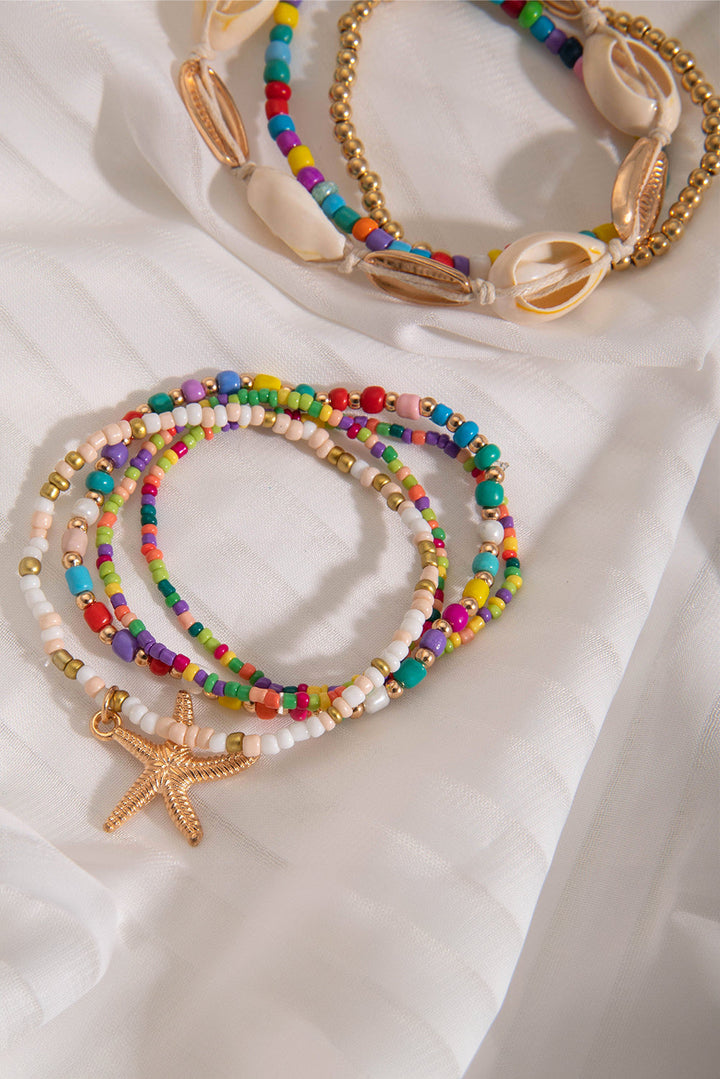 7-teiliges Perlenarmband-Set mit Seesternen und Muscheln