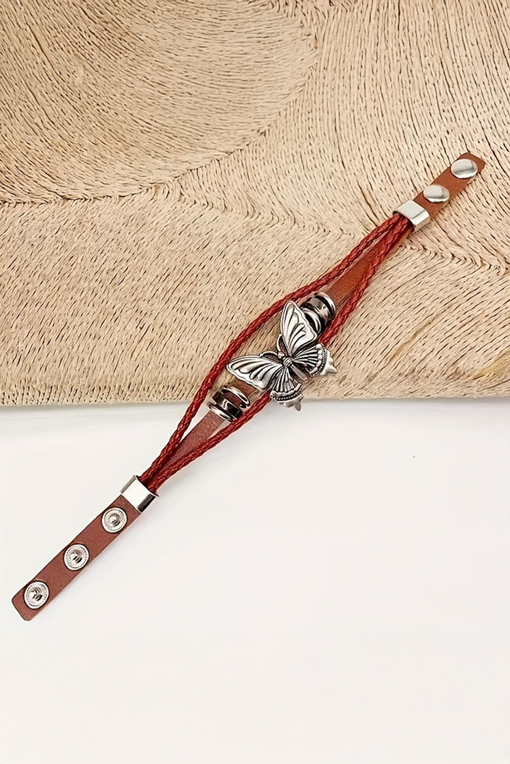 Bracelet à bouton-pression tressé en similicuir exotique avec décor papillon rétro 