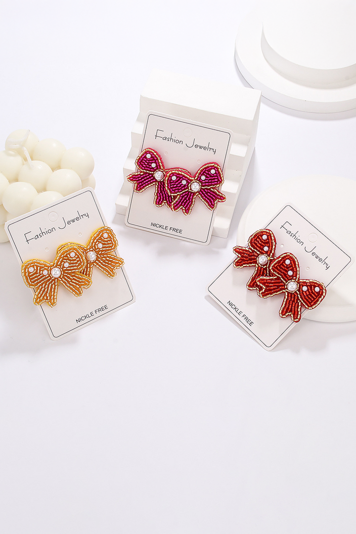 Boucles d'oreilles à tige en forme de nœud en perles de riz