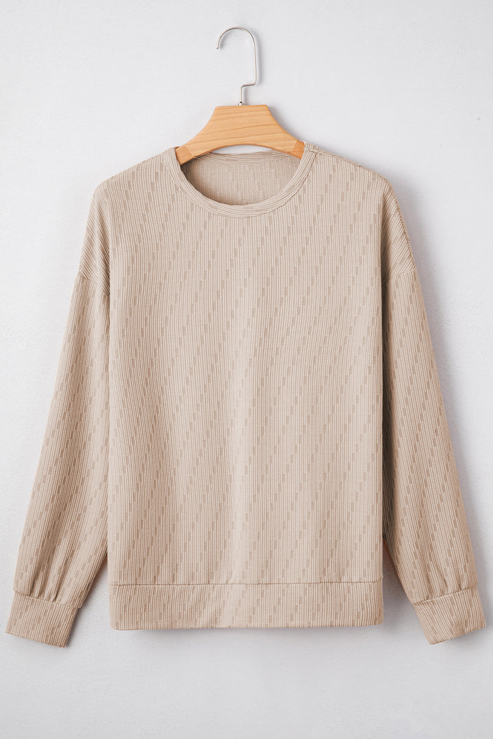 Solid Color Textured Long Sleeve Top