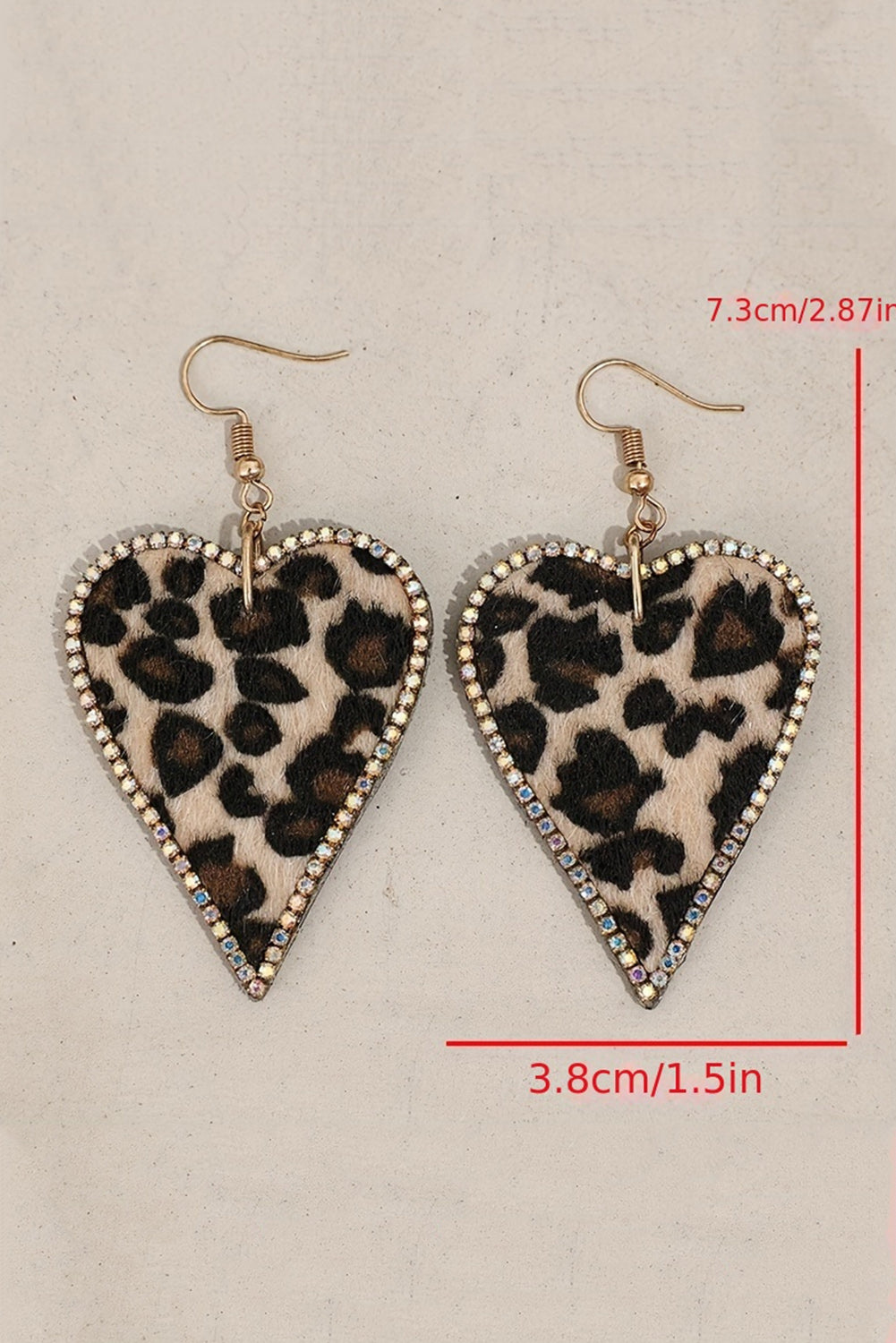 Boucles d'oreilles en forme de cœur à imprimé léopard et bordure en strass