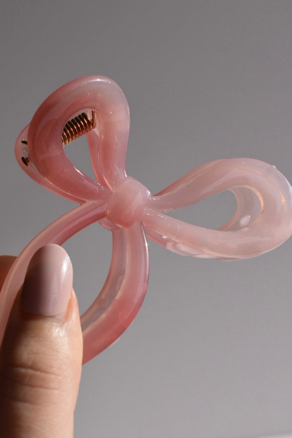 Pince à griffes en forme de nœud à longue queue