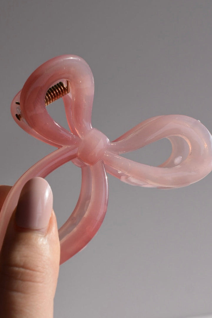 Pince à griffes en forme de nœud à longue queue