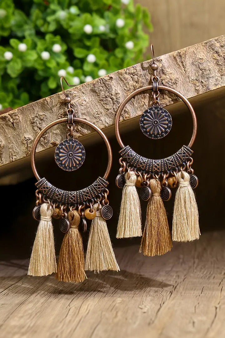 Boucles d'oreilles pendantes rondes à pompons style bohème