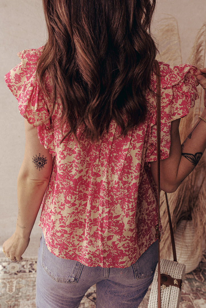 allover printed half button neck ruffle sleeve blouse
